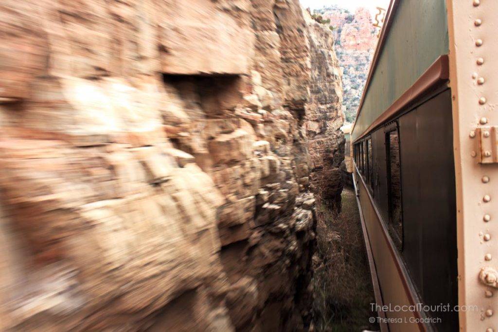 Verde Canyon Excursion Railroad exiting the tunnel in the mountain