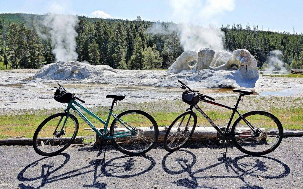 Our Schwinn bikes stylin' and profilin' in front of Grotto Geyser in Yellowstone National Park