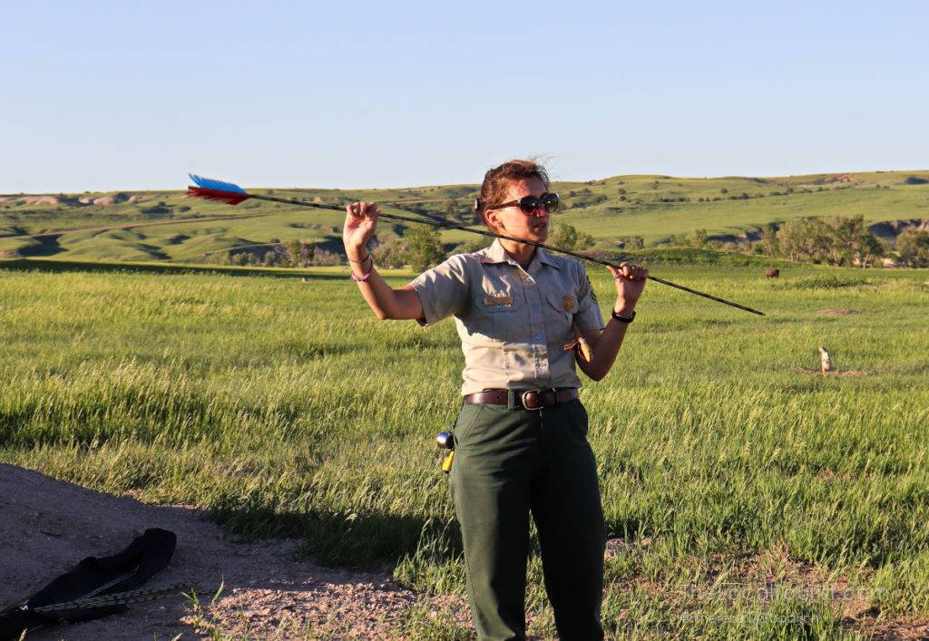 Park Ranger demonstrating how to use an atlatl at Badlands National Park