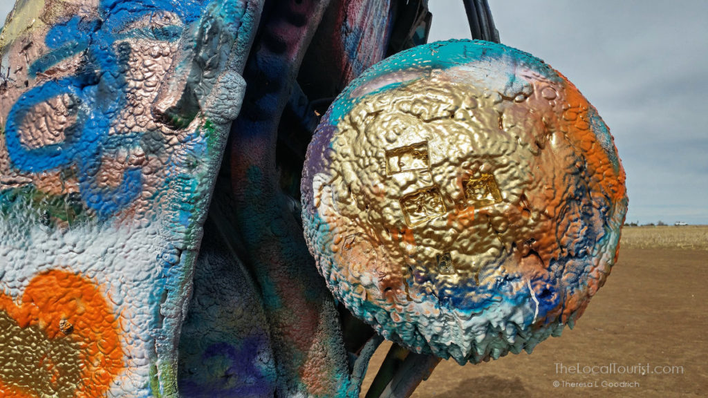 Layers of paint on a tire at Cadillac Ranch