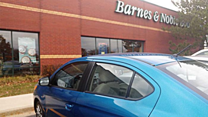Barry the Mitsubishi Mirage outside Barnes & Noble