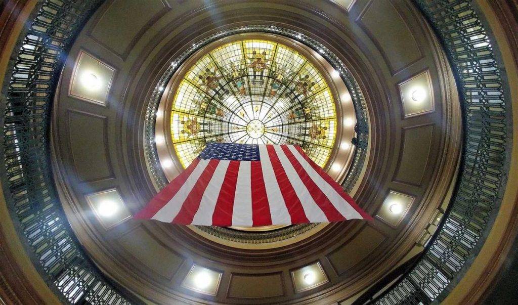 Flag hanging from the stained glass dome atop the Hendricks County Courthouse