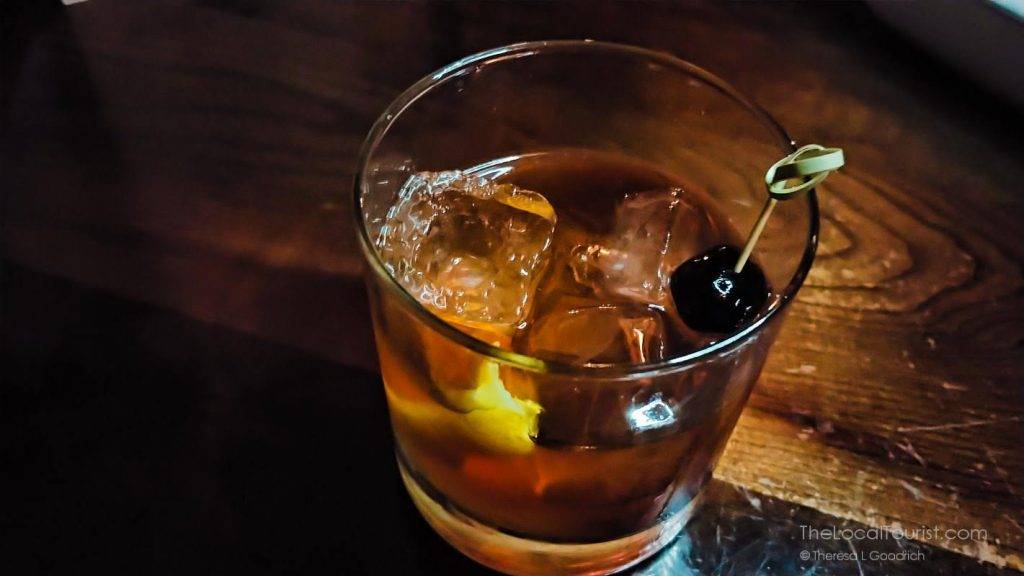 Laphroaig, Aperol, Lillet aperitif wine, Drambuie, and house-made lemon bitters at Clinton Street Social Club