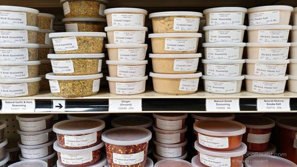 Spice containers inside Stringtown Grocery in Kalona, Iowa