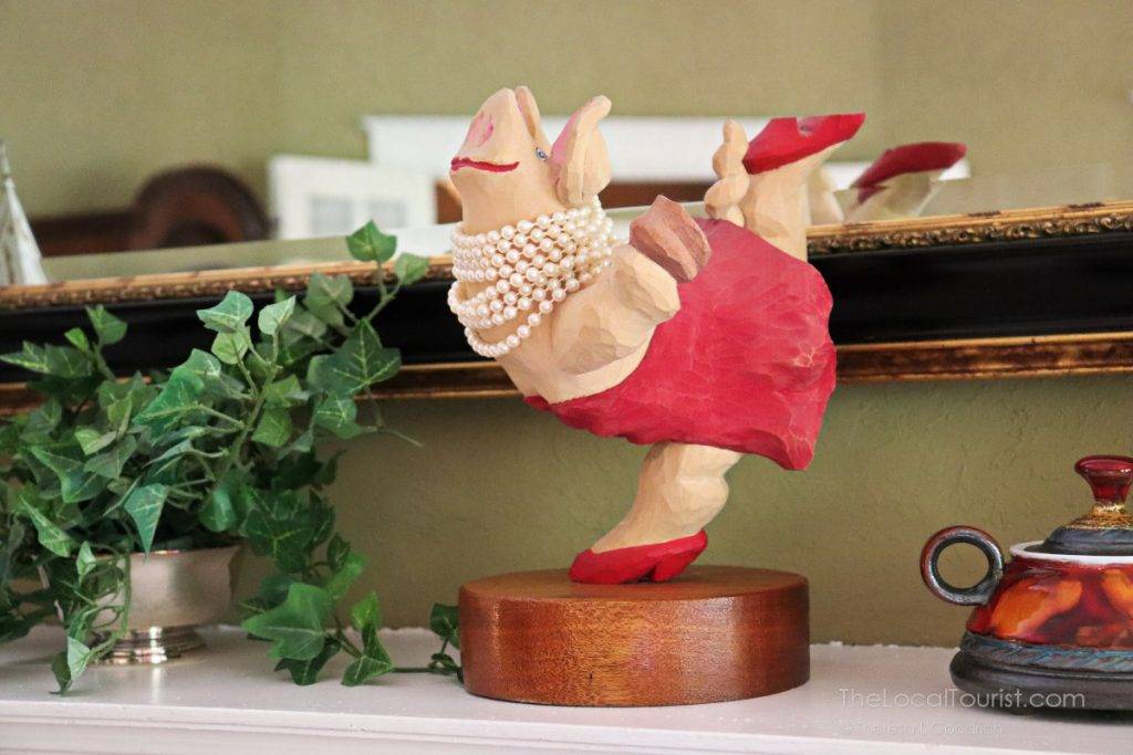 Dancing pig on the mantel