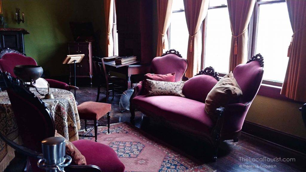 Victorian furniture and oriental rugs decorated the House of the Singing Winds