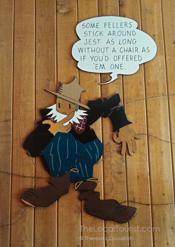 One of Abe Martin's pithy sayings - located over a couch - at Abe Martin Lodge
