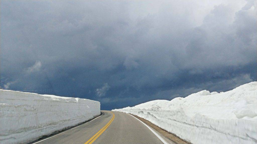 Driving through the snow-capped peaks of Beartooth Highway