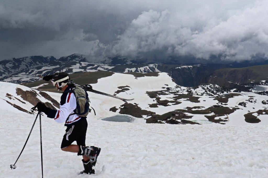 Skiier at top of Beartooth Highway