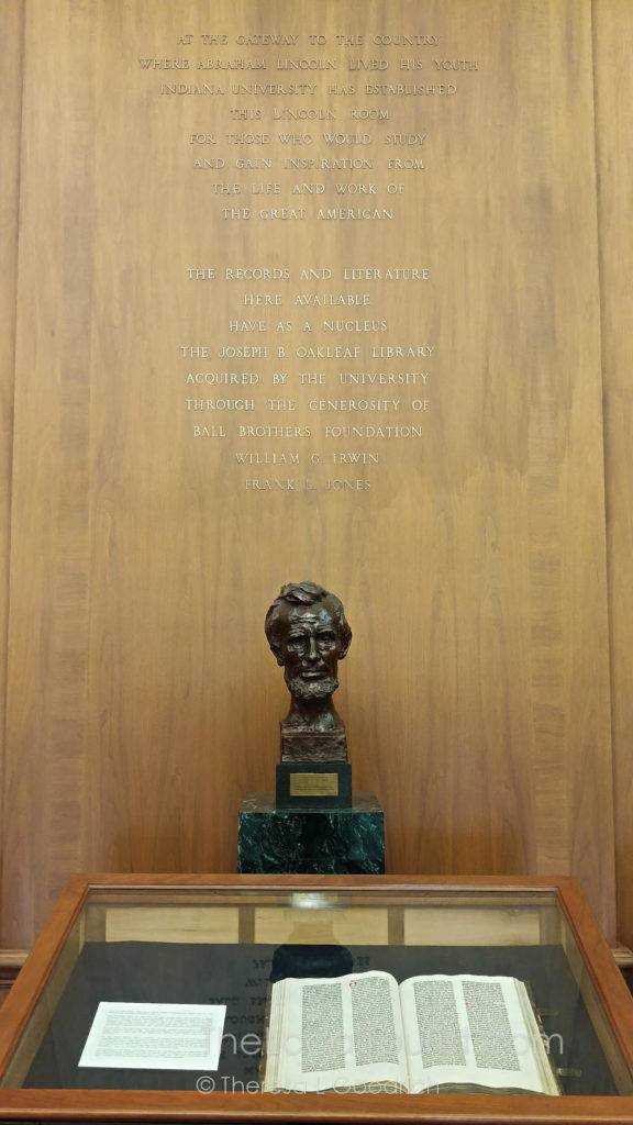 Bust of Abraham Lincoln at Lilly Library with a Gutenberg Bible