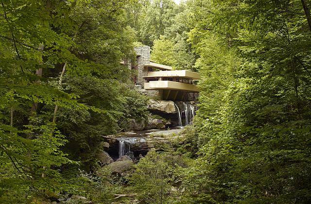 Fallingwater, also known as the Edgar J. Kaufmann Sr. Residence, is a house designed by American architect Frank Lloyd Wright in 1934 in rural southwestern Pennsylvania, 50 miles southeast of Pittsburgh, and is part of the Pittsburgh Metro Area. The house was built partly over a waterfall in Bear Run at Rural Route 1