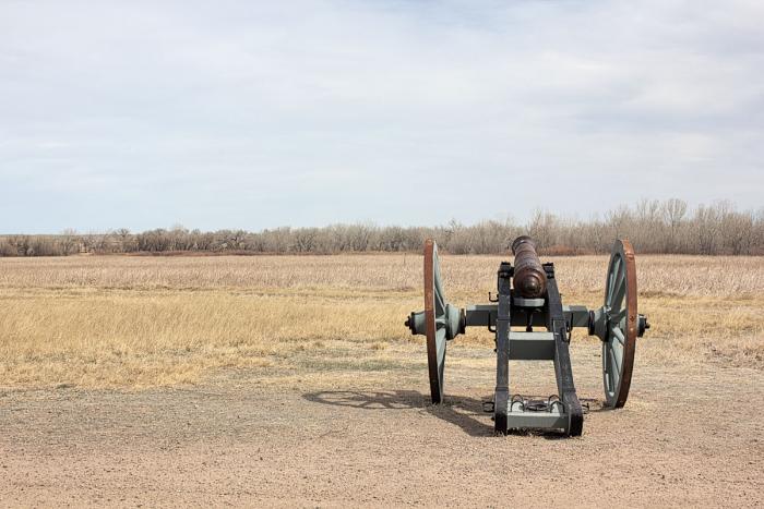 Cannon aimed over the Arkansas River