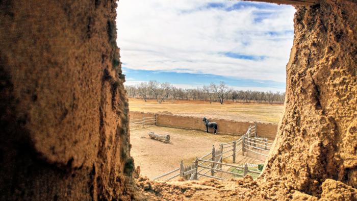 Loophole for firing at attackers from one of the corner bastions at Bent's Old Fort National Historic Site.
