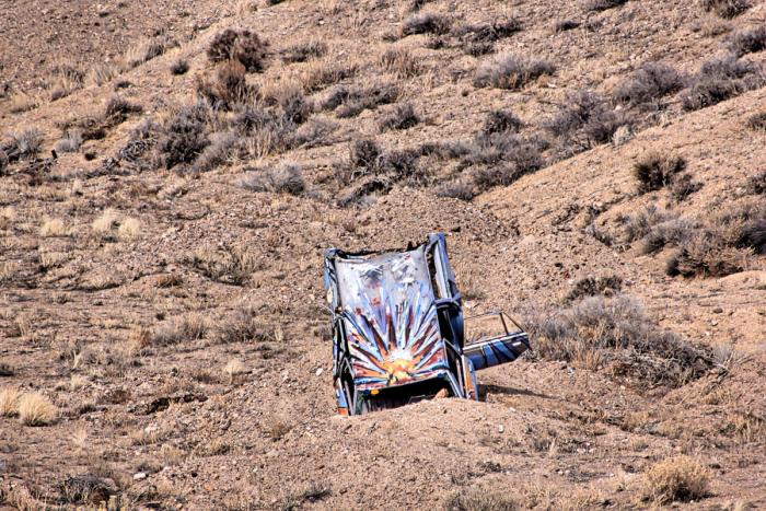car with artistic sun graffiti