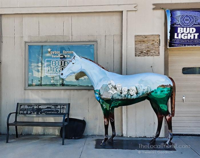 Cowboy Corner, gas station outside of Badlands National Park in Interior, South Dakota. This horse painted with Mount Rushmore is outside the gas station.