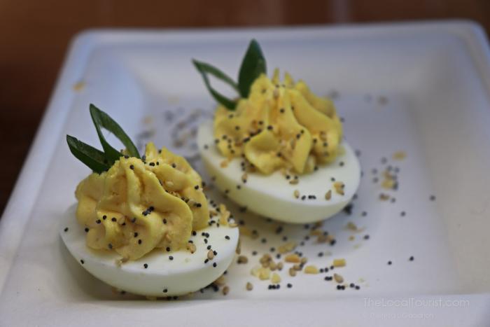 smoked salmon deviled egg, seasoned to taste like it was served on an everything bagel