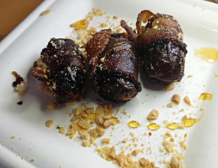 Bacon-wrapped dates stuffed with manchego