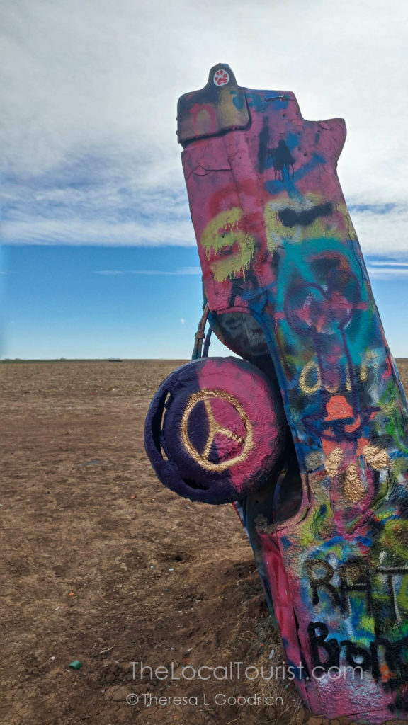 Cadillac buried nose down outside of Amarillo, Texas, on Route 66