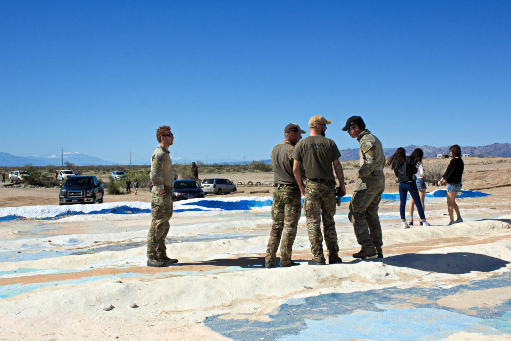 Men wearing camouflage at Salvation Mountain