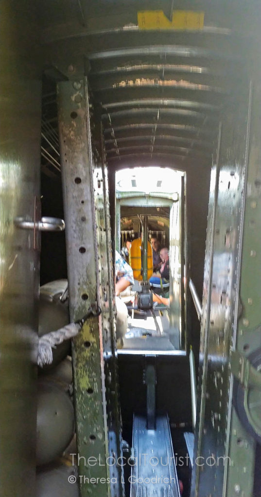 Tight squeeze through the bomb bay to the radio room and the rear compartment