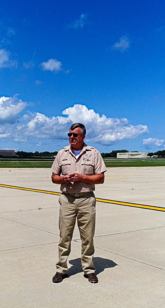Pilot Kenneth Morris giving a debriefing before we board Aluminum Overcast