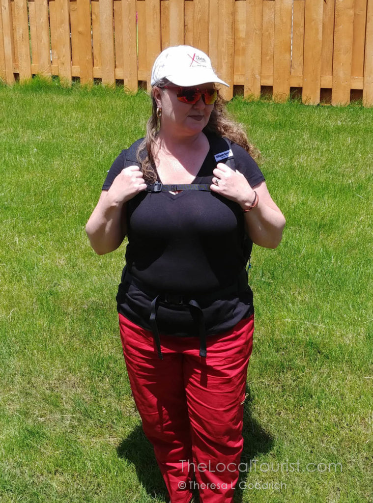 Theresa carrying her Standard Luggage Co. carry-on backpack