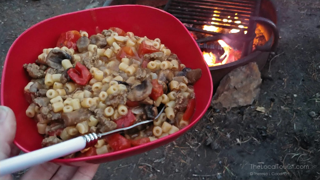 ditali topped with Italian tomatoes, ground beef, and mushrooms