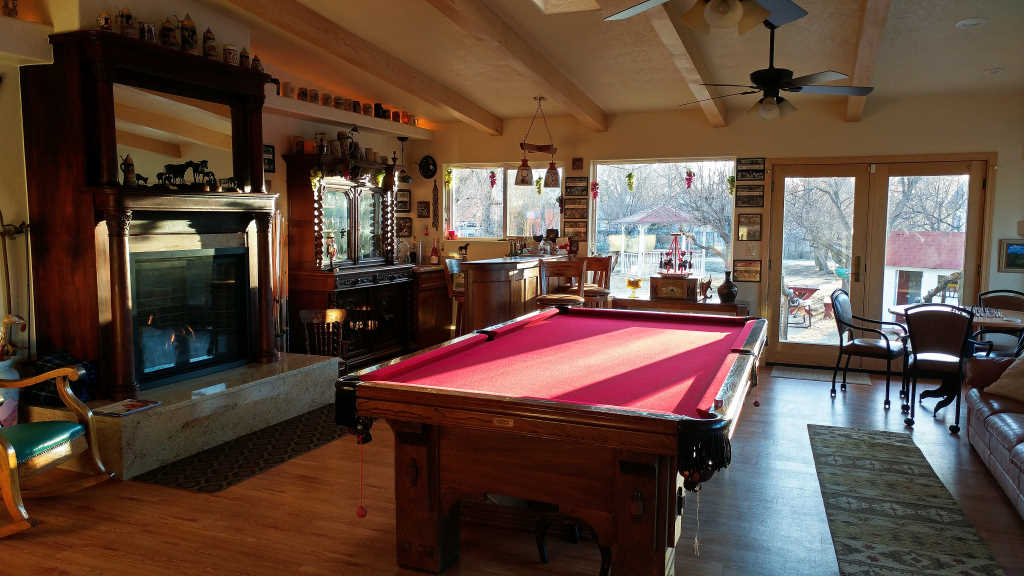 Billiard room with the morning light streaming in at Red Horse Vineyard B&B