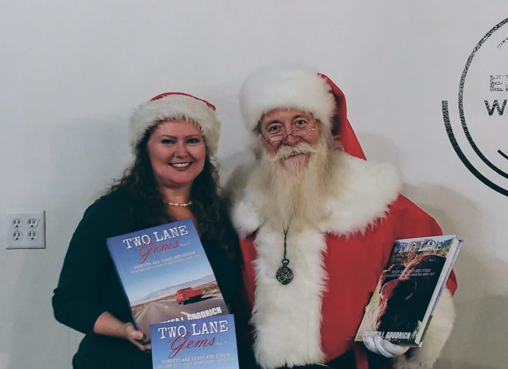 TLG with Santa holding Two Lane Gems