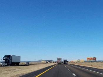 I-40 in New Mexico - a flat stretch of road with lots of billboards